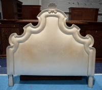 Lot 152 - A 1920's king size padded satine headboard...