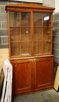 Lot 155 - An early 19th Century mahogany bookcase, with...