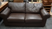 Lot 235 - A modern two-seater settee with loose seat and...
