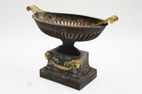 Lot 251 - A 19th Century Adam style oval fire basket...