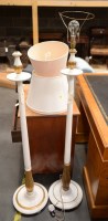 Lot 257 - A pair of white and gold painted wooden...