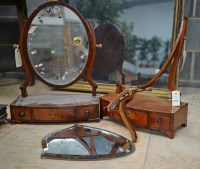 Lot 285 - A Georgian oval mahogany framed swing toilet...