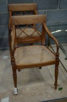 Lot 286 - A pair of stripped walnut Regency style elbow...