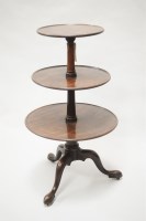 Lot 317 - A George III mahogany graduated three-tier...