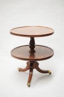Lot 318 - A late George III circular mahogany two-tier...