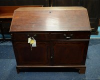 Lot 319 - A Georgian mahogany bureau with a rectangular...