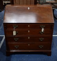 Lot 322 - A late George III mahogany bureau, with...