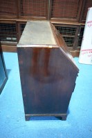 Lot 330 - A George I walnut bureau cabinet, the top with...
