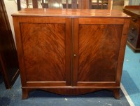 Lot 347 - A George III mahogany gentleman's wardrobe,...