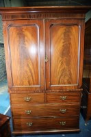 Lot 353 - A Victorian mahogany clothes press, with ogee...
