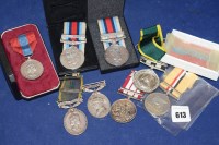 Lot 613 - Medals to include an Efficiency medal awarded...