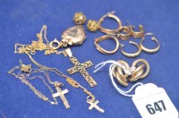 Lot 647 - A pair of 9ct. yellow gold earrings; 9ct....