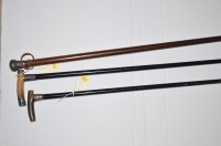 Lot 1034 - Horn handled and silver mounted walking sticks...