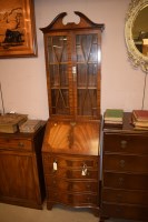 Lot 1109 - A Georgian style mahogany serpentine front...