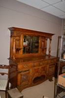 Lot 1288 - An Arts & Crafts oak mirror back sideboard,...