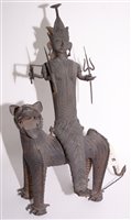 Lot 276 - A tribal bronze leopard and deity rider,...