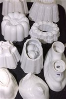 Lot 219 - Nine pottery jelly and blancmange moulds, by...