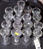 Lot 228 - Seventeen 19th Century glass penny licks.