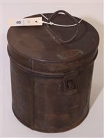 Lot 161 - A cylindrical tin box with "NER" relief panel...