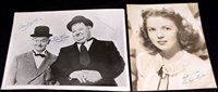 Lot 129 - Stan Laurel and Oliver Hardy: a signed black...