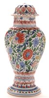 Lot 3 - An 18th Century Chinese writhen baluster vase and cover