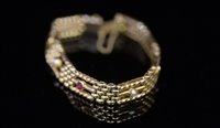 Lot 725 - Pearl and Ruby bracelet.