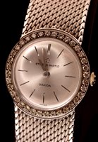 Lot 680 - A lady's 18ct. white gold bracelet watch.