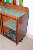 Lot 762 - A cocktail bar; a rosewood sideboard; and a stained glass superstructure.