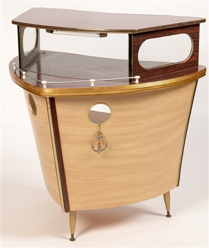 Lot 1096 - Umberto Mascagni, Bologna, Italy : a mid 20th Century boat form cocktail bar.