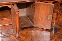 Lot 948 - A George I burr walnut and banded bureau.