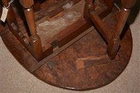 Lot 1015 - An Elm drop leaf table