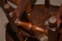 Lot 1015 - An Elm drop leaf table