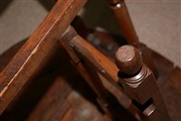 Lot 1015 - An Elm drop leaf table
