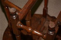 Lot 1015 - An Elm drop leaf table