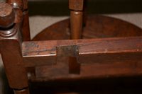 Lot 1015 - An Elm drop leaf table