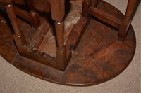 Lot 1015 - An Elm drop leaf table