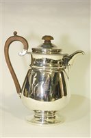 Lot 602 - George IV silver hot water jug