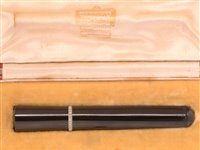 Lot 643 - Cartier diamond set jet cheroot holder