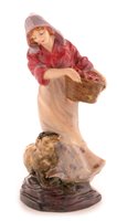 Lot 134 - An early Royal Doulton figure Fruit gathering.