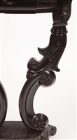 Lot 967 - A 19th Century Singhalese carved ebony and calamander specimen occasional table.