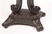 Lot 967 - A 19th Century Singhalese carved ebony and calamander specimen occasional table.