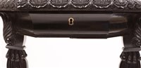 Lot 967 - A 19th Century Singhalese carved ebony and calamander specimen occasional table.