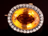 Lot 728 - Citrine and diamond brooch