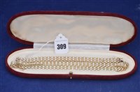 Lot 309 - gold bracelet and necklace