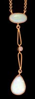 Lot 711 - Opal and diamond pendant