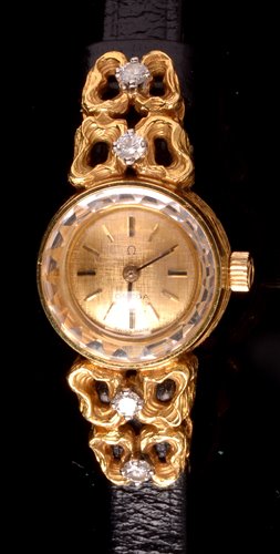 Lot 699 - An Omega 18k cocktail watch.