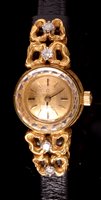 Lot 699 - An Omega 18k cocktail watch.