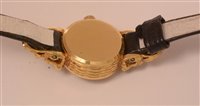 Lot 699 - An Omega 18k cocktail watch.