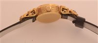 Lot 699 - An Omega 18k cocktail watch.
