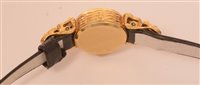 Lot 699 - An Omega 18k cocktail watch.